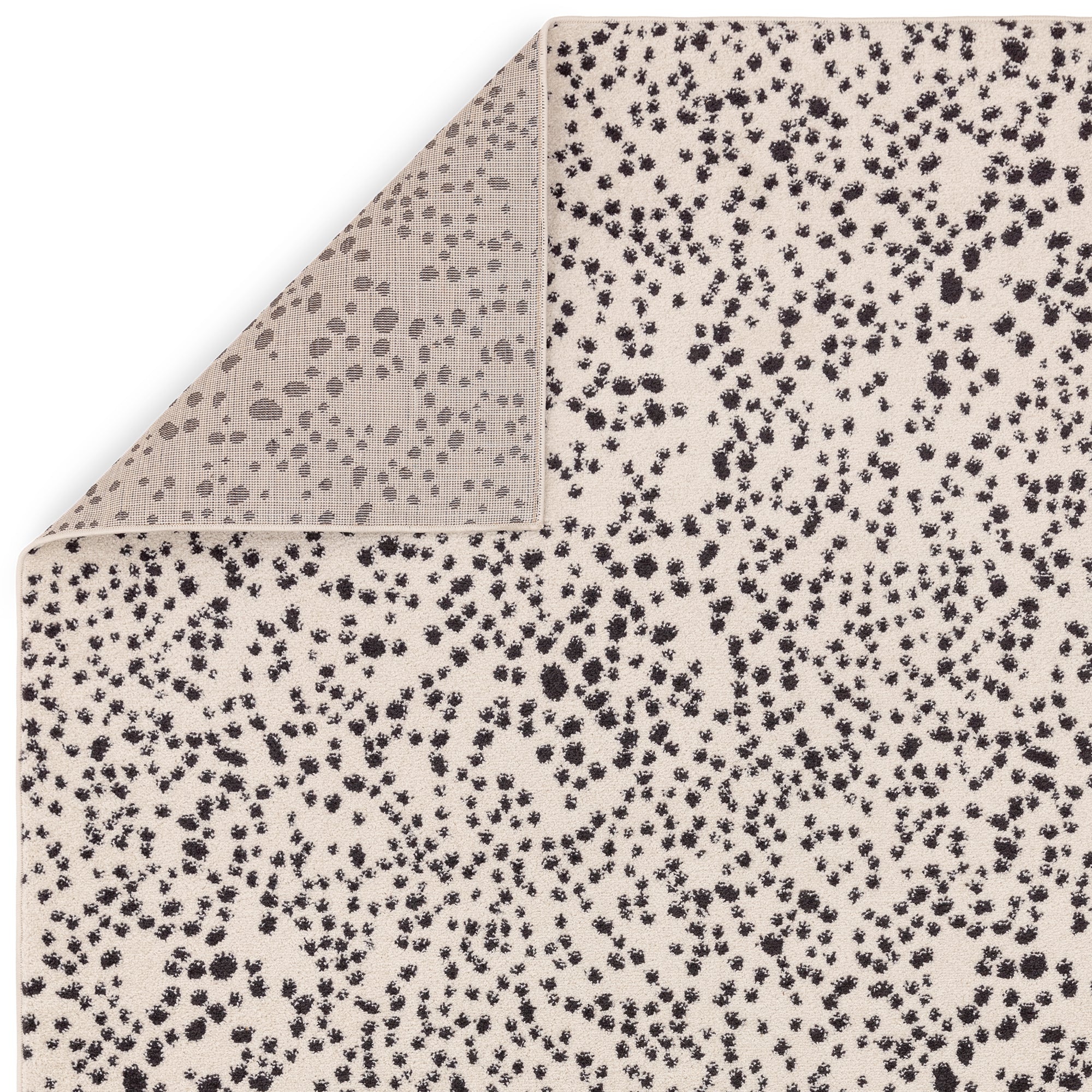 Alfombra Muse MU11 negra con manchas