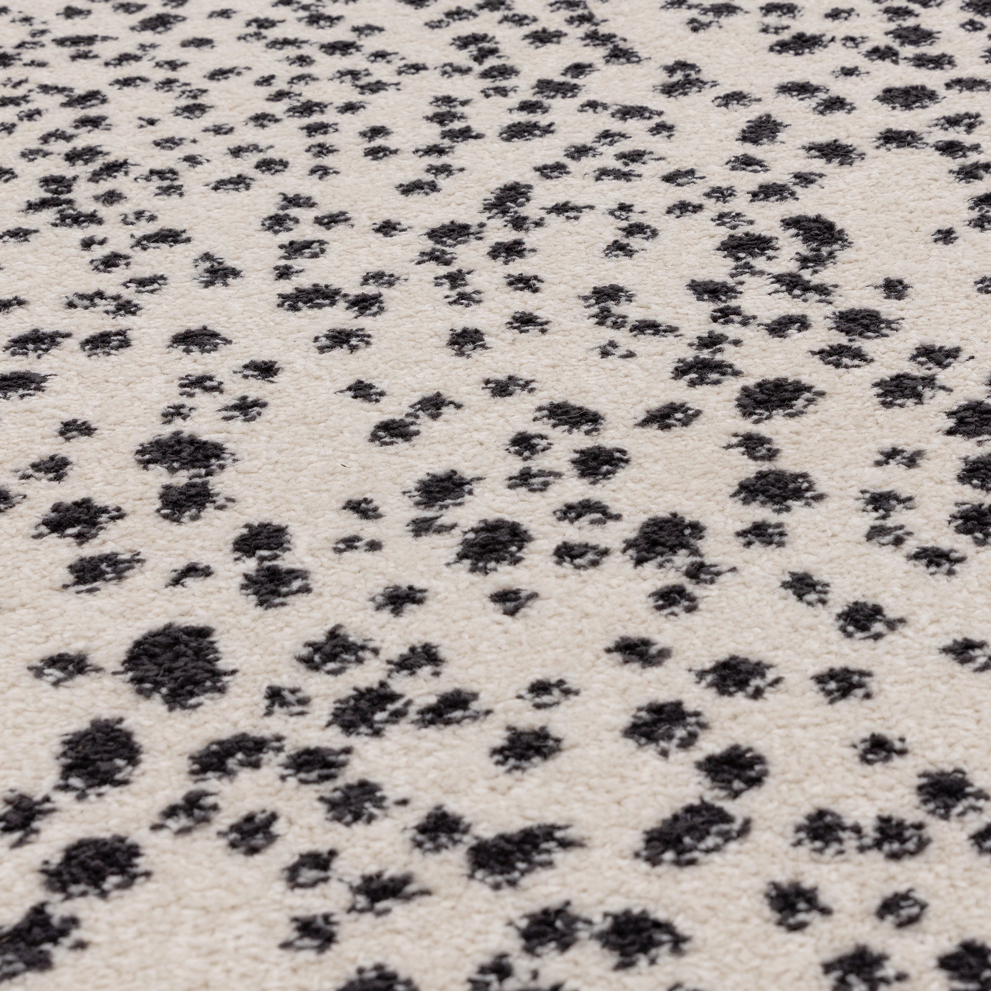 Alfombra Muse MU11 negra con manchas
